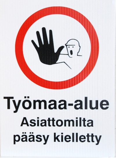 Työmaa-alueen varoituskyltti